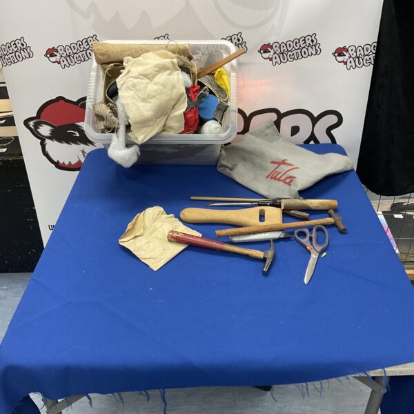 Assorted vintage hand tools in a tool lot.