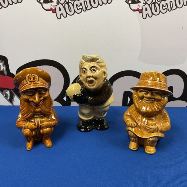 Vintage Torquay and HJ Wood character jugs in a lot.