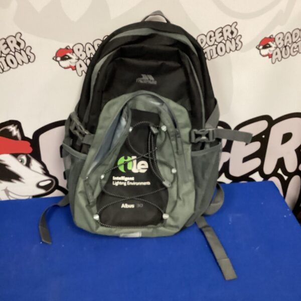 Front view of a black Trespass rucksack.