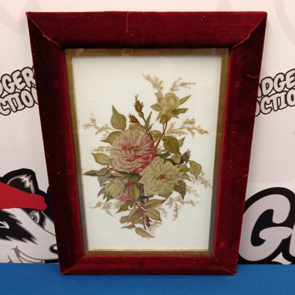 Antique velvet framed rose study on opaque glass.