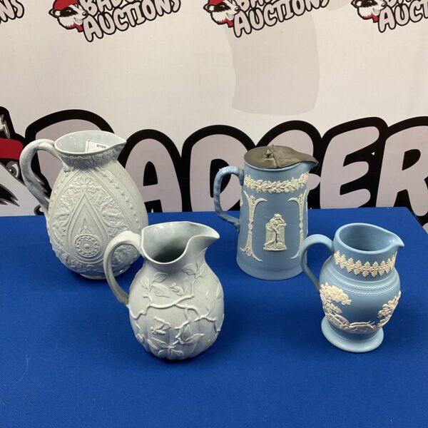 Antique Victorian Dudson jasperware pitcher with blue and white floral design.