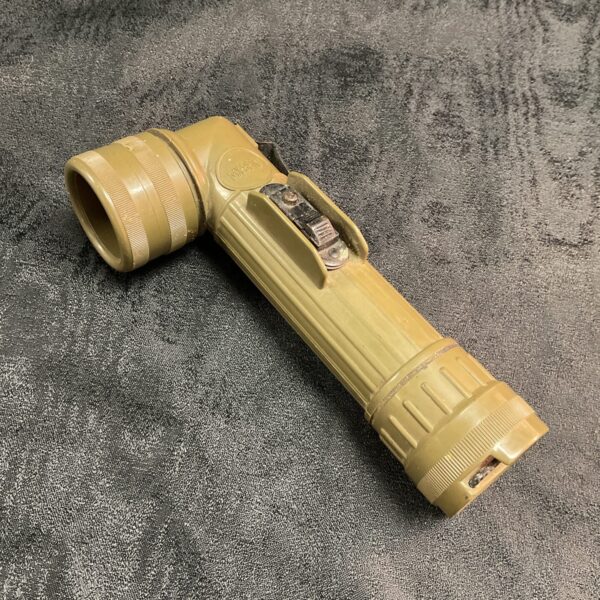 Vintage Vietnam War US Army torch with olive drab finish.