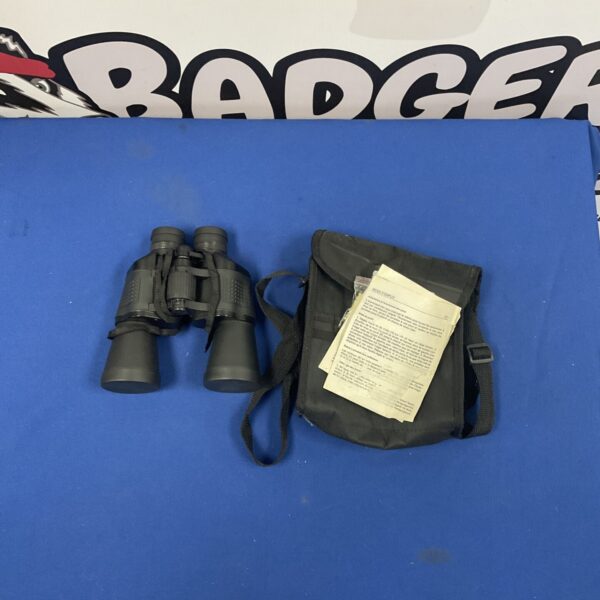 Vintage 10x50 binoculars with neck strap, side view.