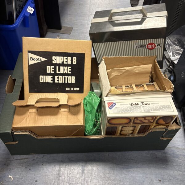 Vintage 8mm film projectors including Eumig Mark 8 and Boots models.