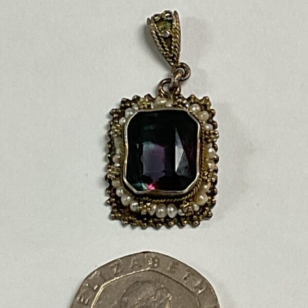 Vintage amethyst and pearl pendant with whitemetal setting.