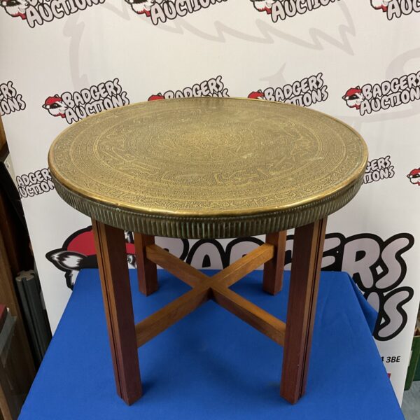 Intricate vintage Arabic brass topped table with tripod base.