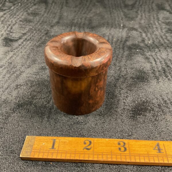 Vintage bakelite ashtray with marbled reddish-brown pattern.