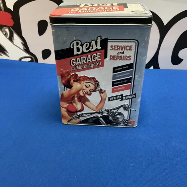 Vintage Best Garage storage tin with retro advertising graphics.