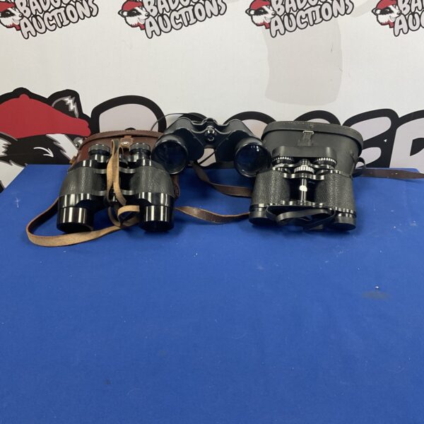 Vintage Boots branded binoculars in a lot of three.