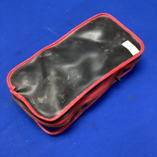 Vintage boules carry case with red zip closure.