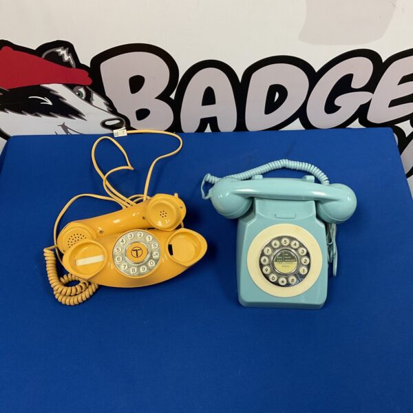 Vintage British Telecom push button phone in orange.