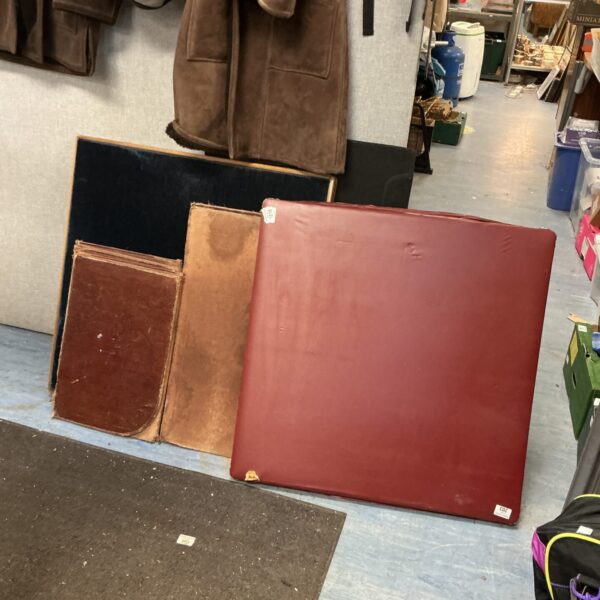 Vintage card table set with red felt surface.