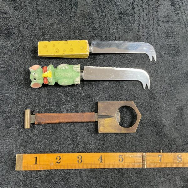 Vintage 1970s cheese knives and bottle opener, colourful kitchenalia.