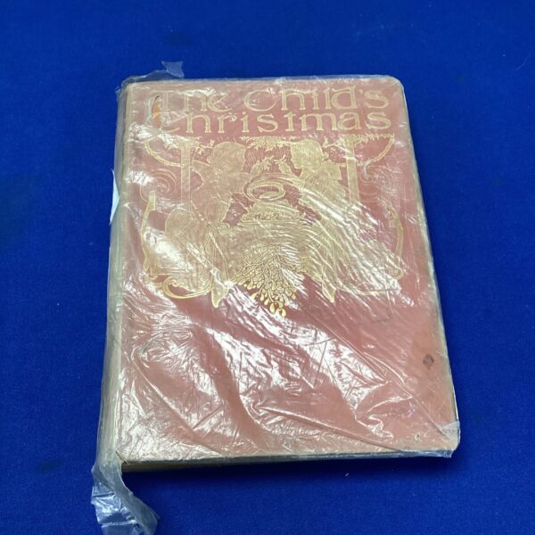 Vintage "The Child's Christmas" book cover with gold embossing.