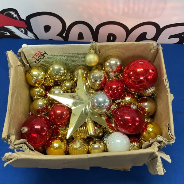 Vintage Christmas decorations box with colourful glass ornaments.