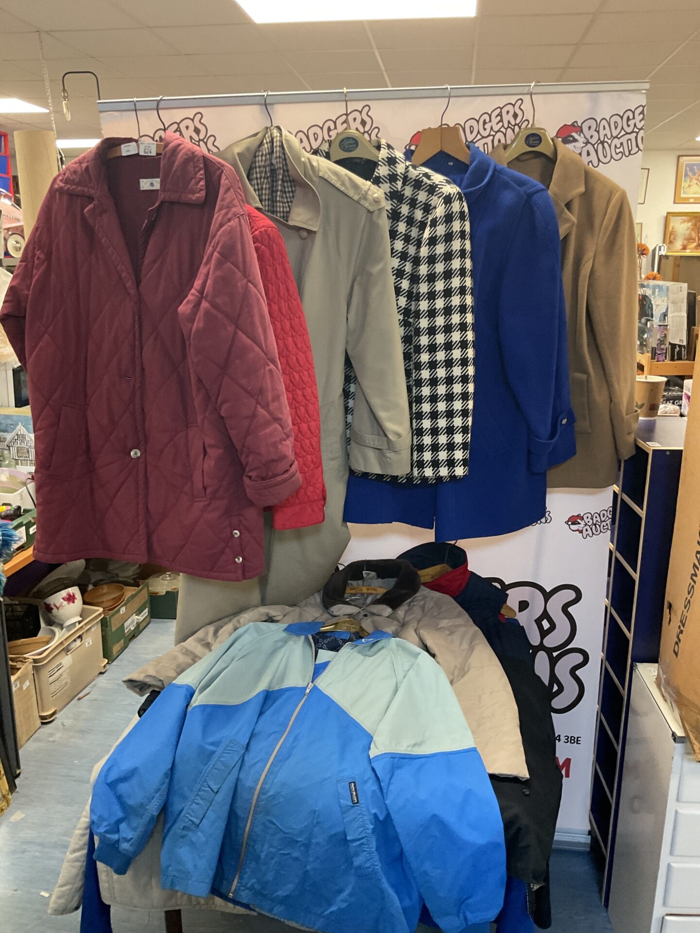 Mixed lot of vintage coats and jackets, including patterned and solid designs.