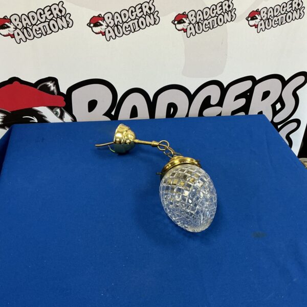 Vintage cut glass pineapple lamp for table lighting.