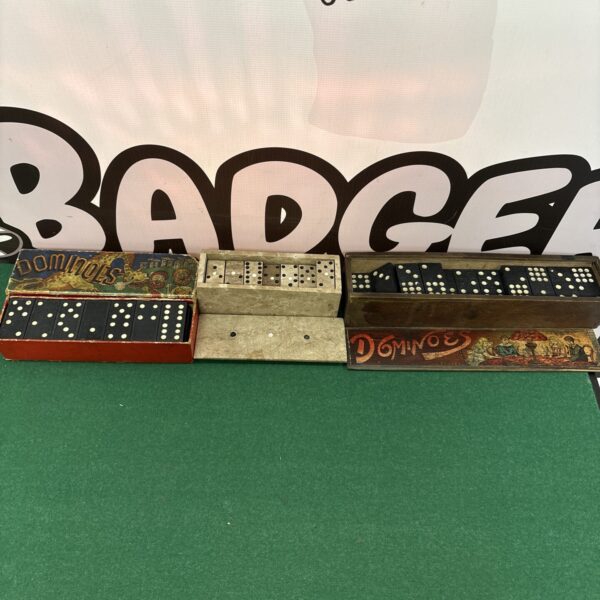 Vintage domino set with bone or ivory tiles.