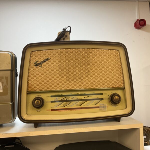 Vintage Ferguson valve radio in wooden cabinet.