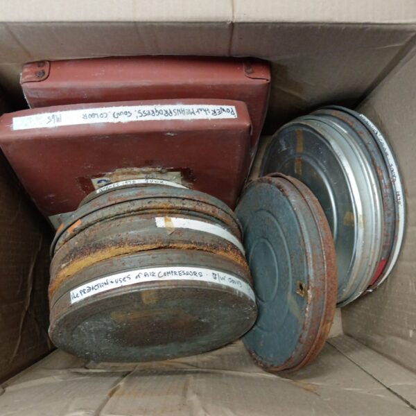 Vintage 16mm and 8mm film reels from the Wycombe Museum collection.