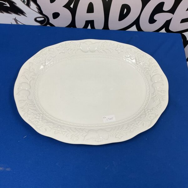 Large vintage white porcelain serving plate with floral design.