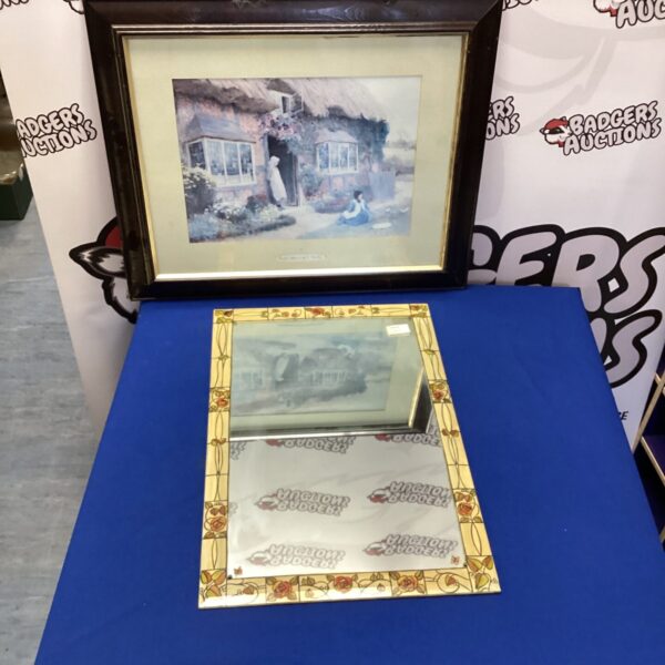 Vintage framed print of a rural cottage scene for wall decor.