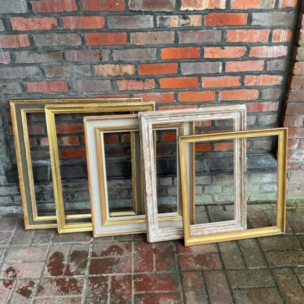 Lot of five vintage gilt wooden picture frames.