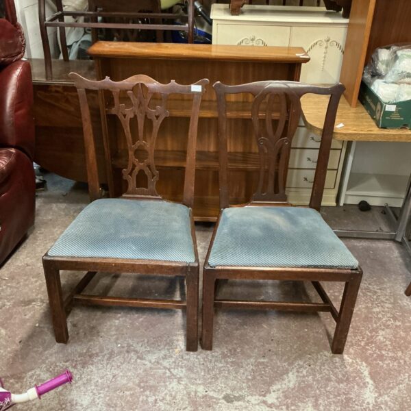 Pair of vintage hall chairs with spindle backs.