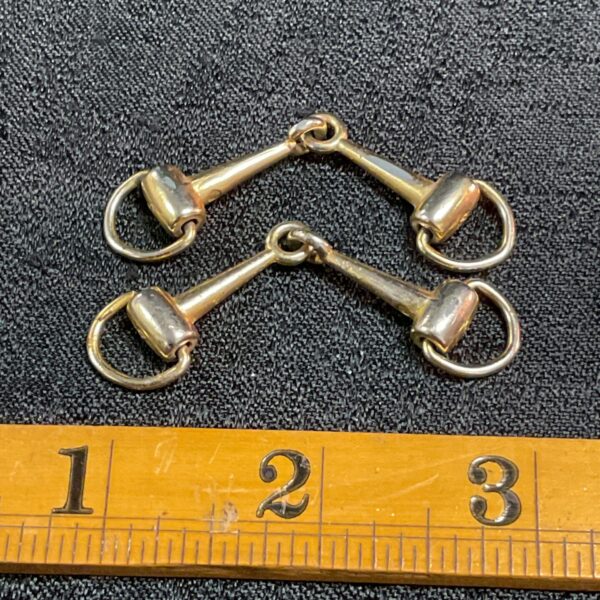 Vintage gold-toned horse bit cufflinks, 1970s style.