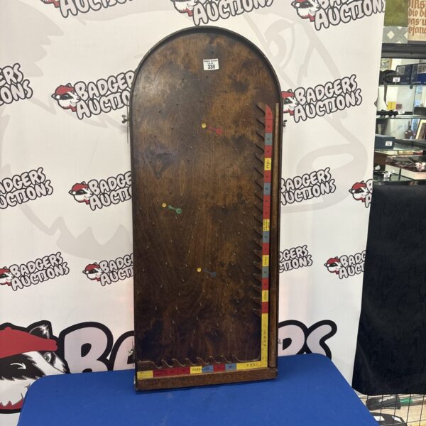 Front view of a vintage Larena bagatelle board game.