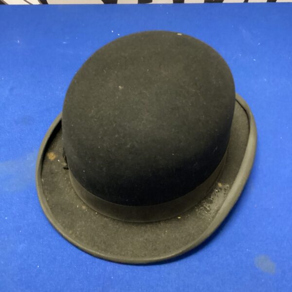 Black vintage Lincoln Bennett bowler hat, classic menswear.