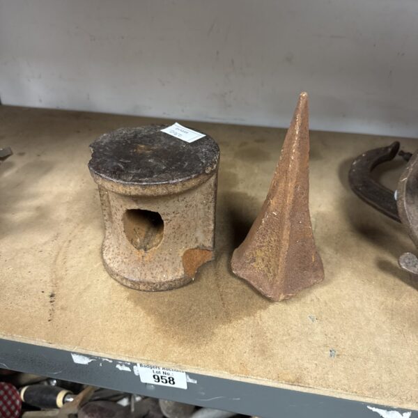 Vintage log splitting spike with a worn, metal head.