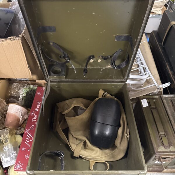 Vintage military storage box with canvas satchel and canteen inside.