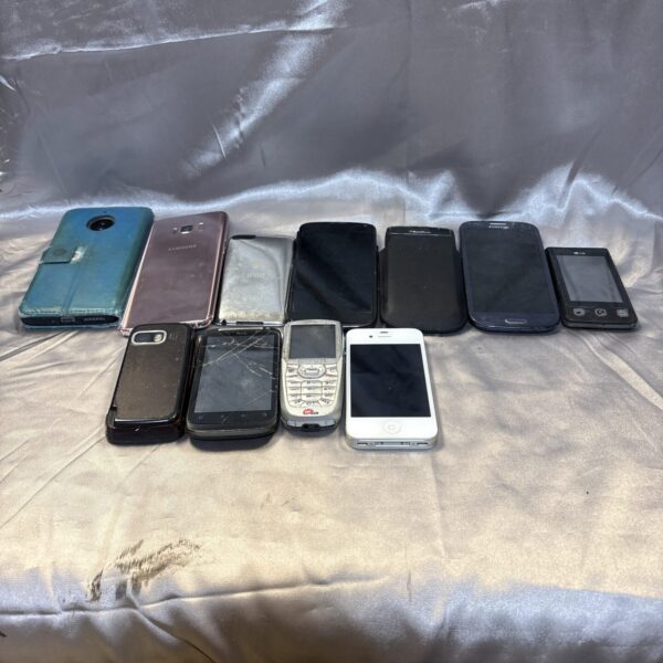 Vintage mobile phone lot with Apple iPod and retro handsets.