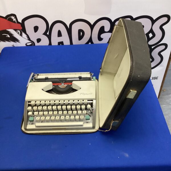 Vintage Olympia typewriter in its original hard case.