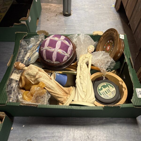 Vintage ornament collection featuring figurines and moulds.