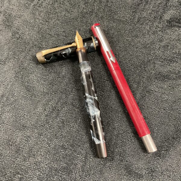 Vintage Parker fountain pen lot with marbled brown barrel.