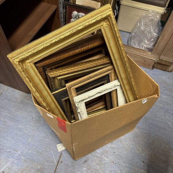 Lot of vintage gold picture frames for wall decor.