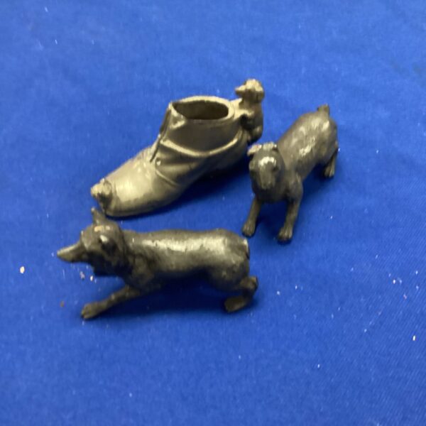 Vintage pincushion and dog figurines, antique sewing collectible.