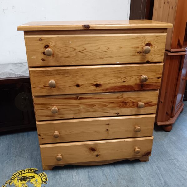 Vintage pine chest of drawers with three drawers, ideal for bedroom storage.