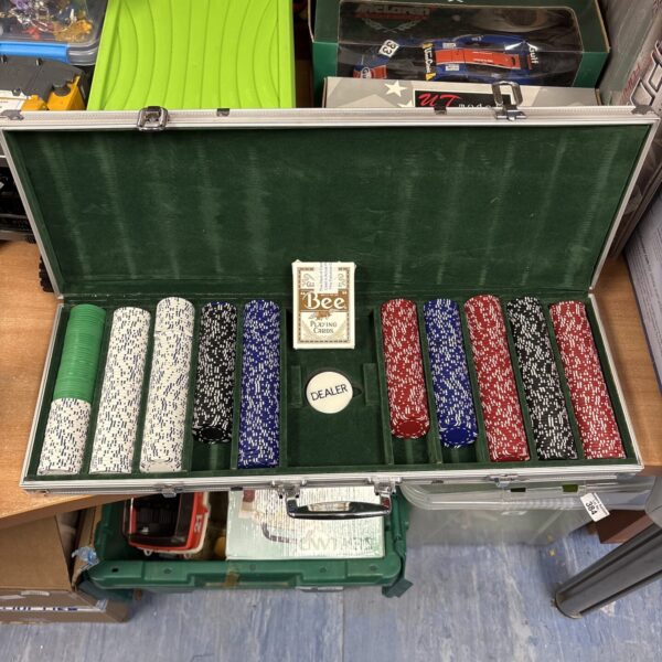 Vintage aluminium cased poker chip set with colourful chips.