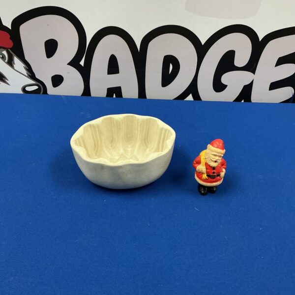 Vintage porcelain jelly mould with Santa Claus design.