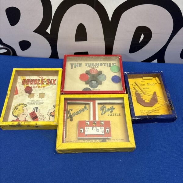 Vintage puzzle games lot, antique mechanical puzzles for collectors.