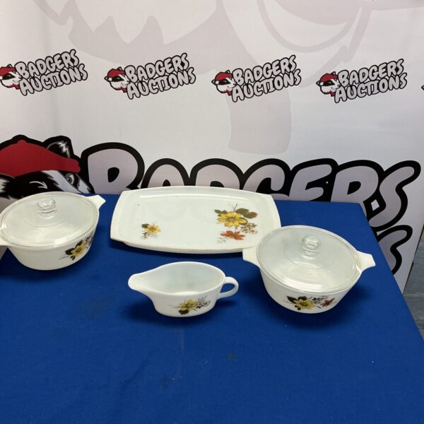 Vintage Pyrex casserole dish with a floral pattern.