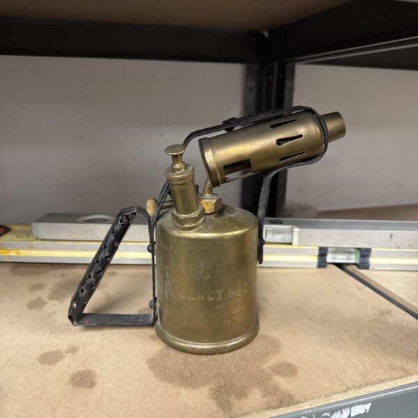Vintage brass Regency No2 blowtorch, antique tool for metalworking.