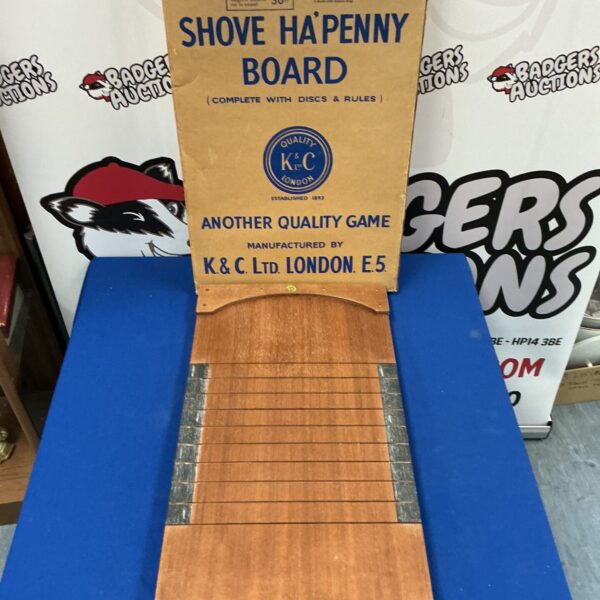 Vintage K&C London shove ha’penny board for collectors and pub game enthusiasts.