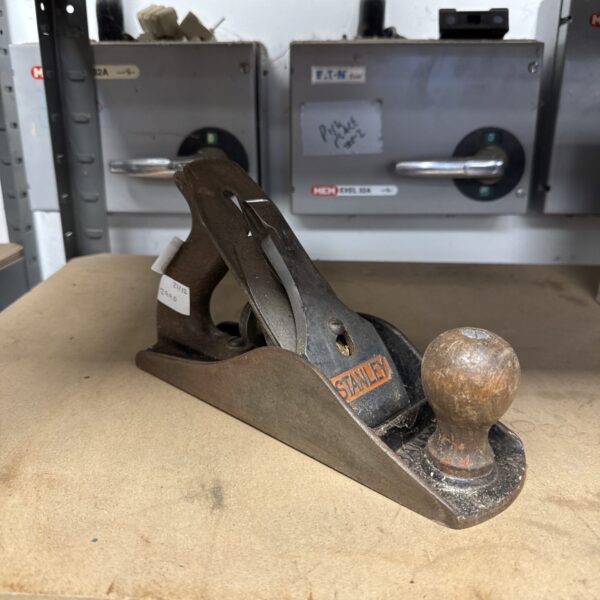 Vintage Stanley Bailey wood plane for woodworking and collecting.