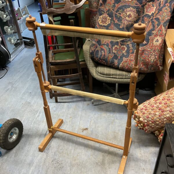 Vintage wooden tapestry stretcher frame for textile art.
