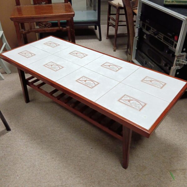 Vintage tile top coffee table with wood frame.