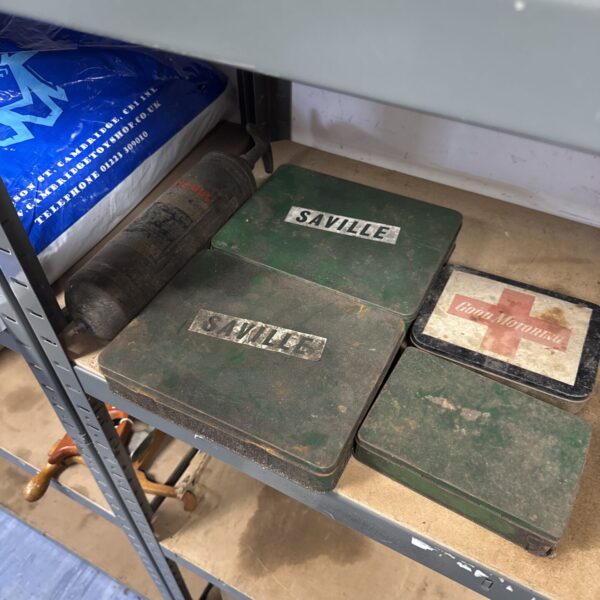 Vintage tin selection lot with various sizes and designs.